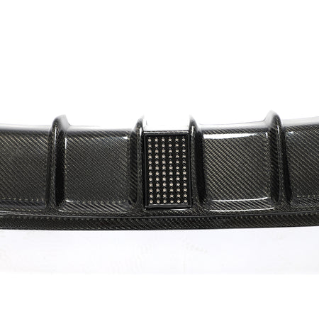 BMW 4 Series M Sport carbon fiber rear diffuser side mesh detail