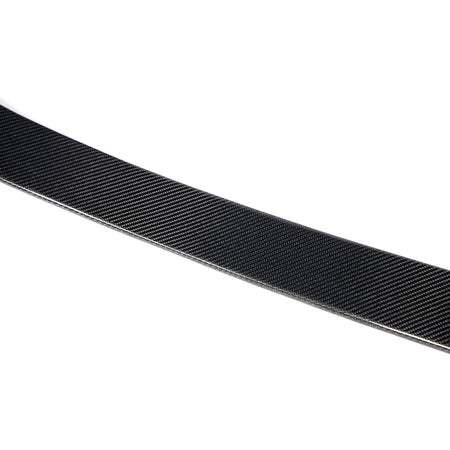Audi A4 carbon fiber trunk spoiler edge profile and finish detail
