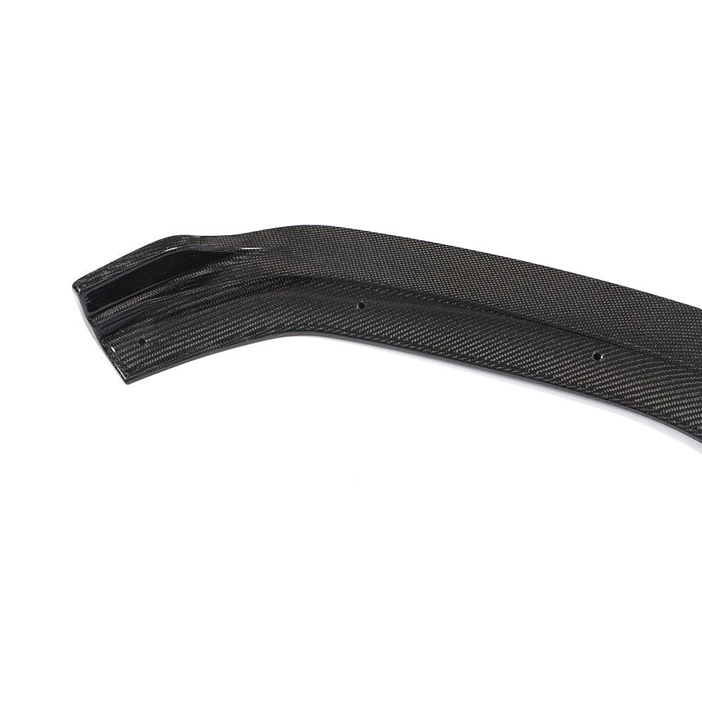 Close-up of the woven carbon fiber surface and gloss finish on the Audi A5/S5 B9 front lip