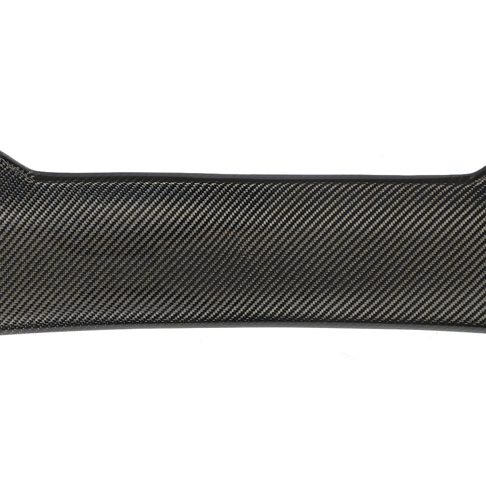 Carbon fiber weave close-up on Audi A6 C6 trunk spoiler
