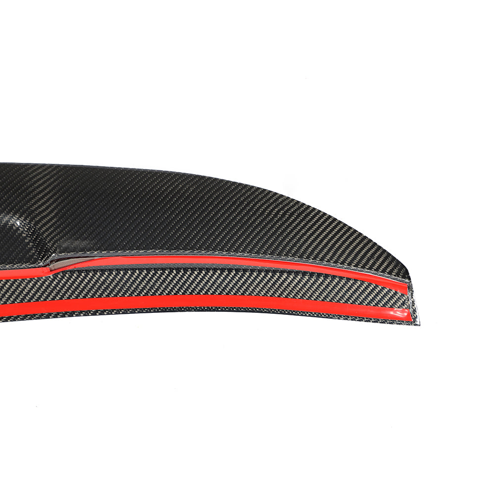 Double-sided mounting tape on Audi A6 C6 carbon fiber trunk spoiler