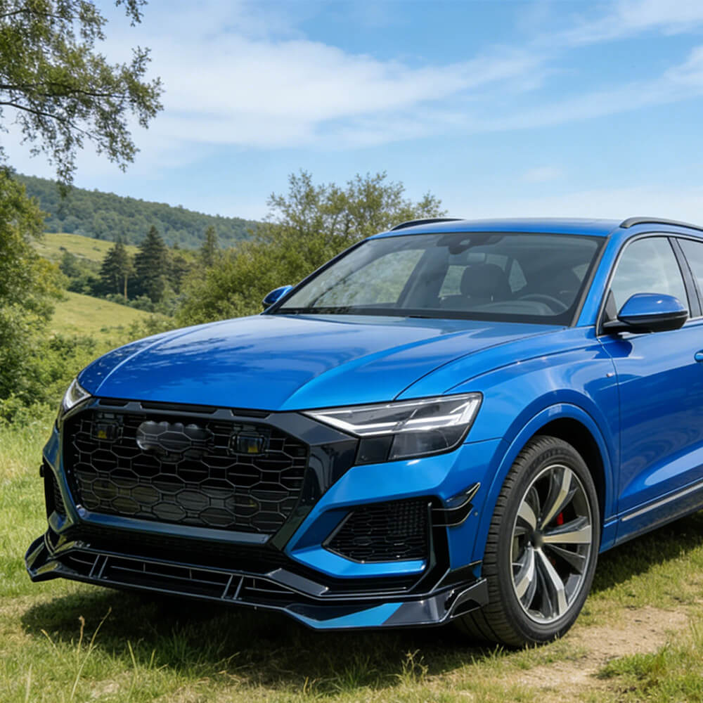 Audi Q8 3-piece gloss black front splitter installed on front bumper