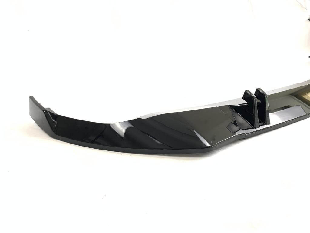Audi Q8 ABS front bumper lip side profile and raised outer extension