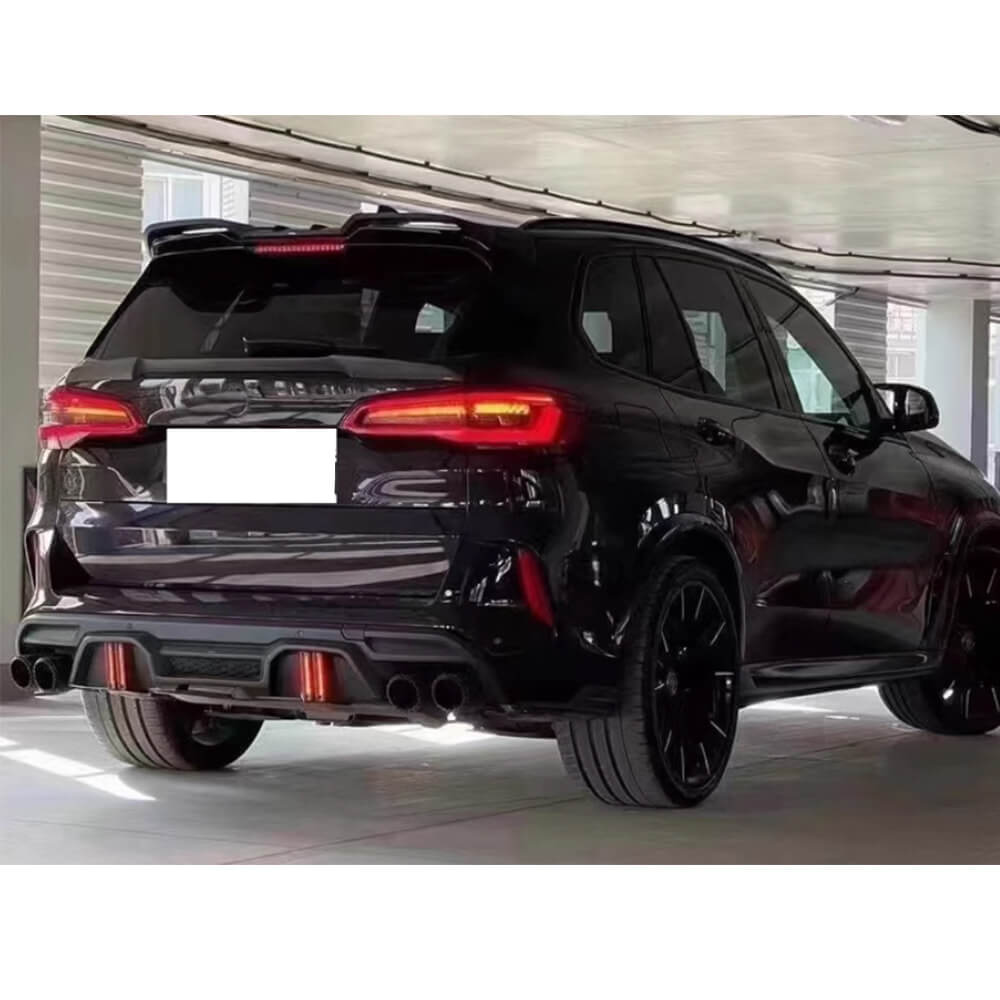 BMW F95 low-profile rear trunk spoiler installed rear three-quarter view