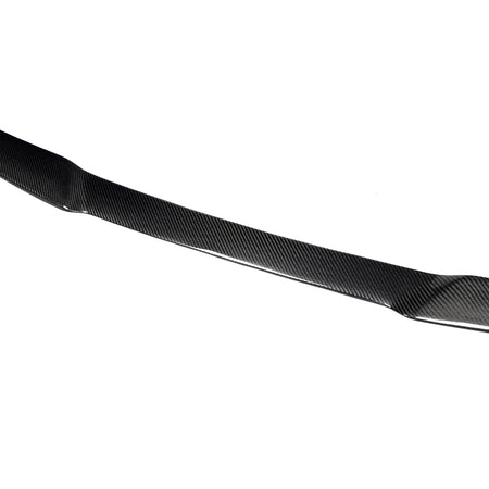 BMW F95 rear trunk spoiler center contour and carbon fiber surface