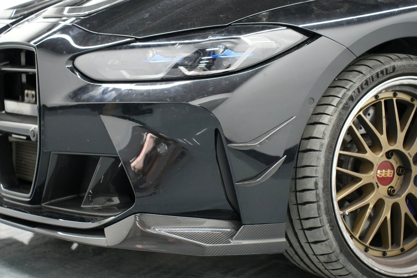 BMW G80 M3 carbon fiber front lip and bumper canards installed