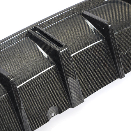 BMW M440i carbon fiber rear diffuser gloss weave close up