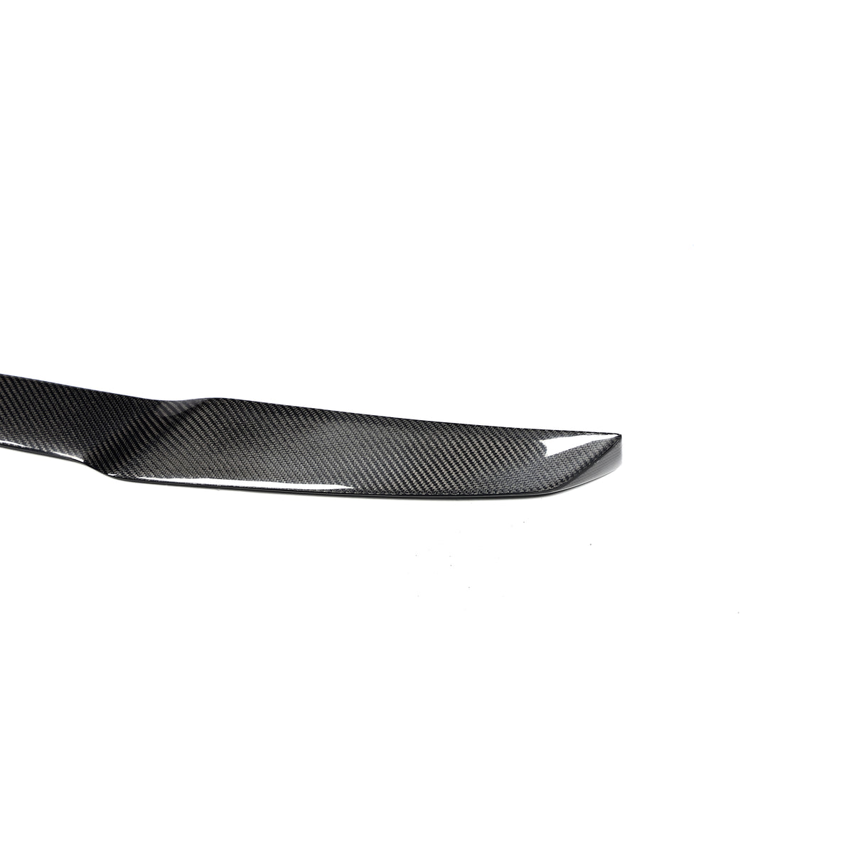 BMW X5M carbon fiber rear spoiler outer end and gloss finish detail
