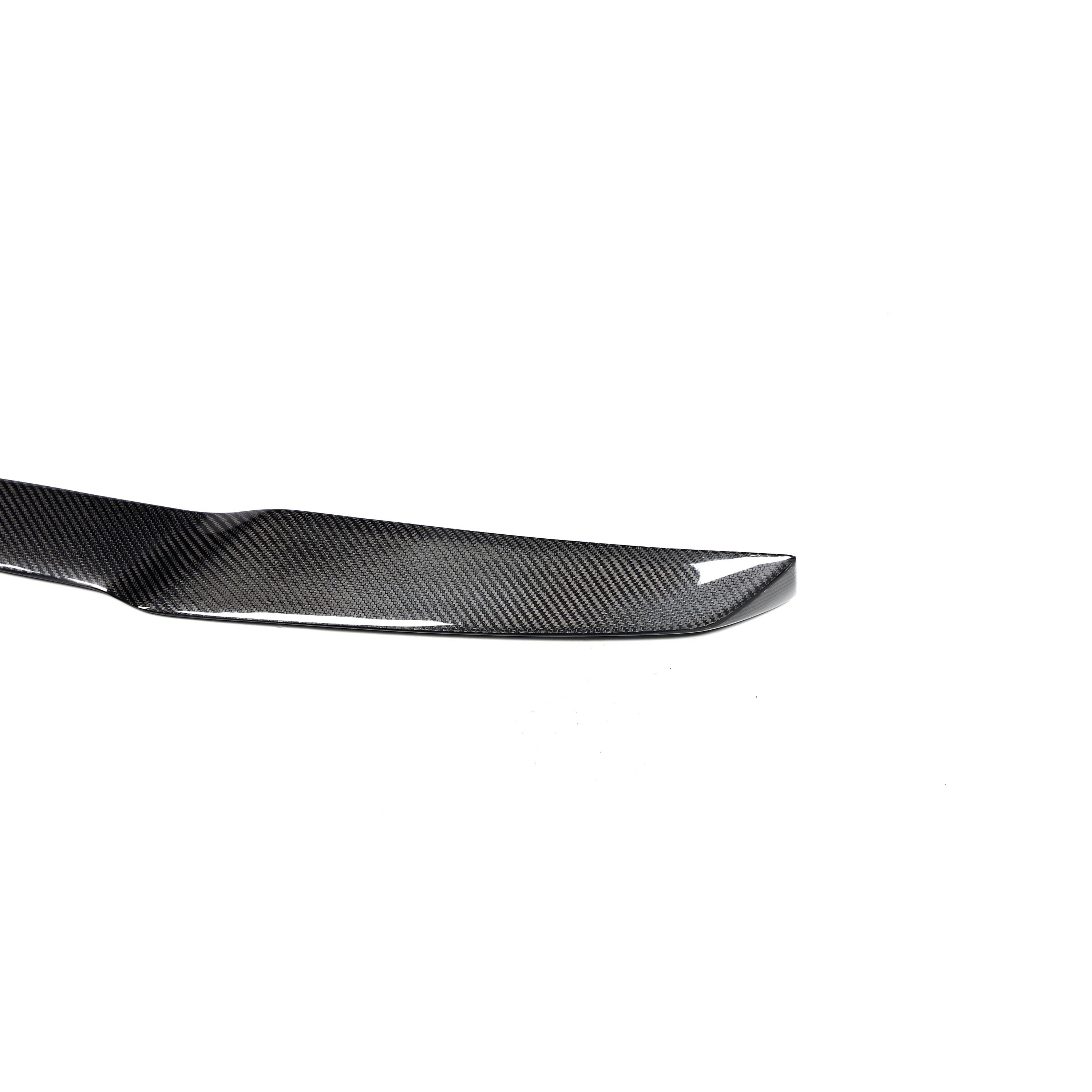 BMW X5M carbon fiber rear spoiler outer end and gloss finish detail