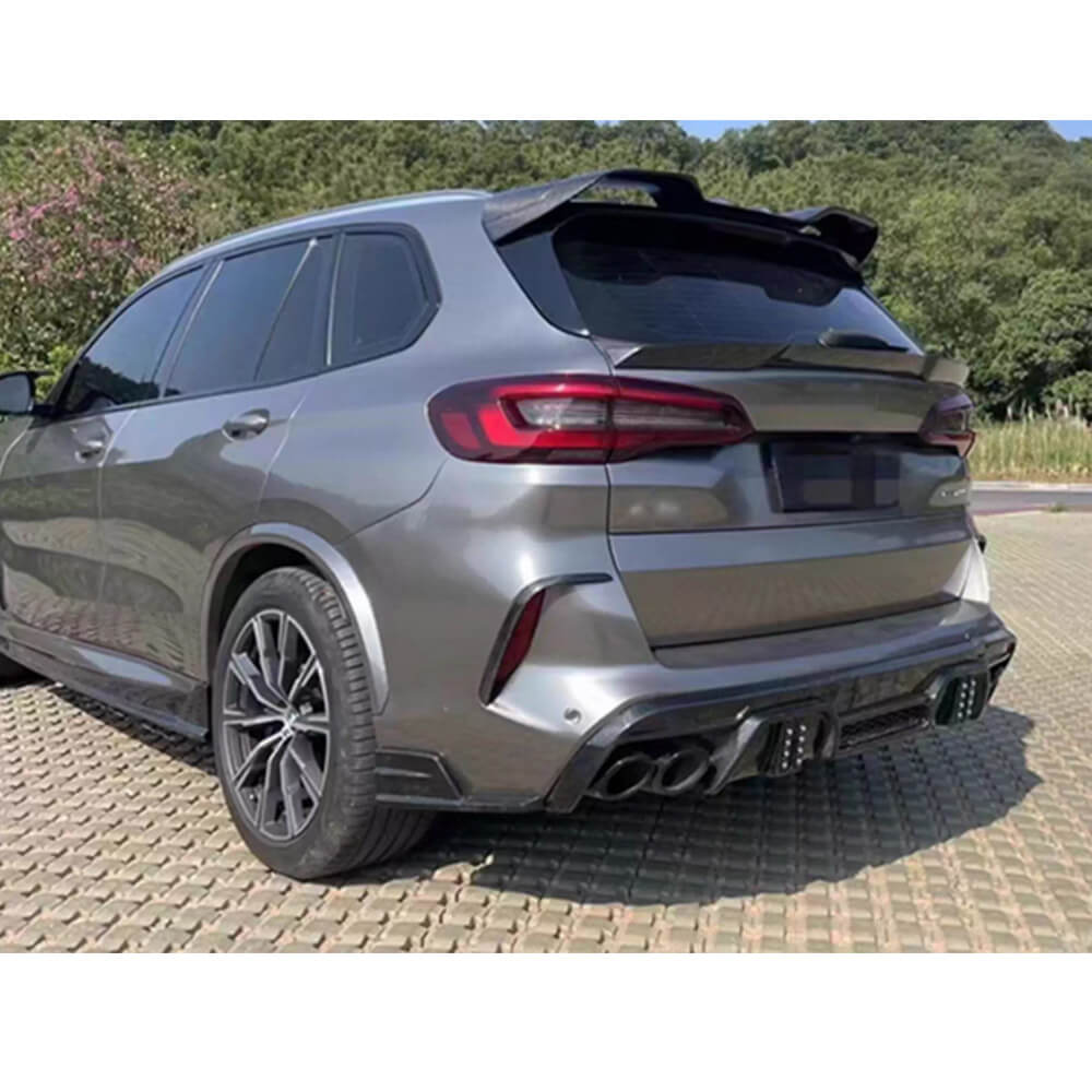 BMW X5M carbon fiber rear spoiler installed from rear side angle