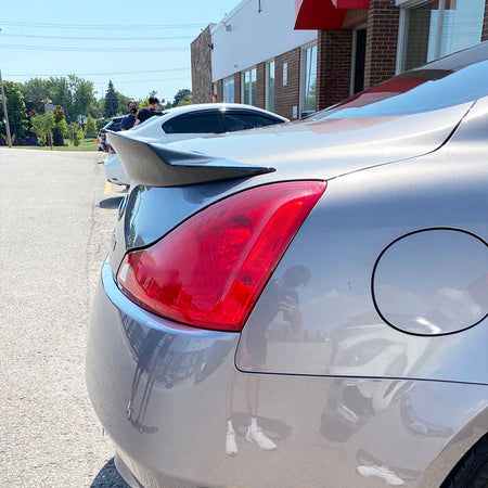 Infiniti Q60 Coupe rear trunk spoiler side installed view