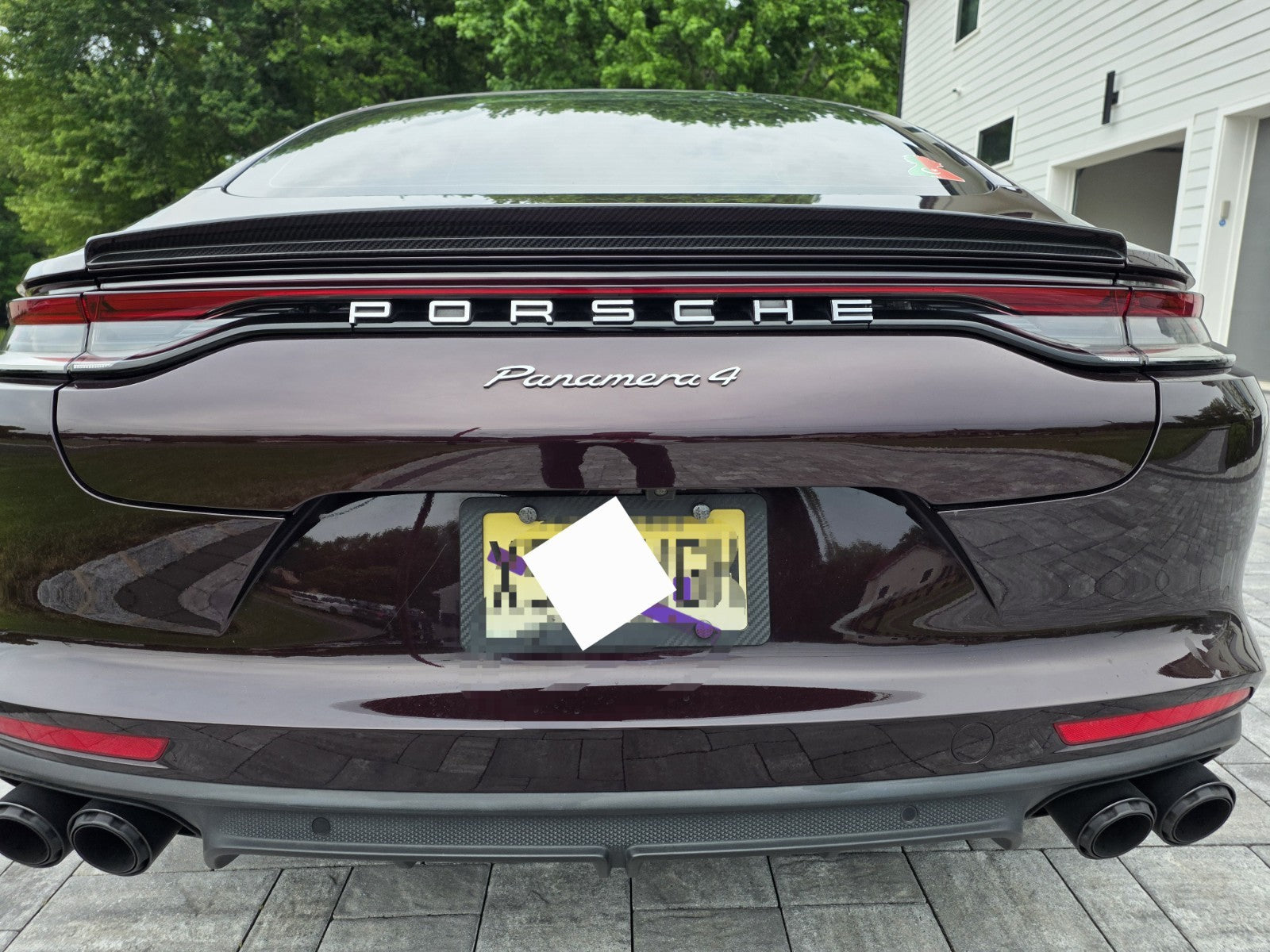 Porsche Panamera 971 hatchback rear trunk spoiler installed rear view